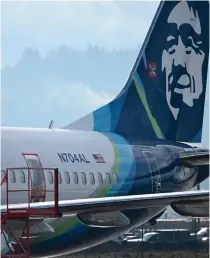  ?? AFP PHOTO ?? MORE TROUBLE
Alaska Airlines N704AL, a 737 Max 9 that figured in a mid-flight mishap on Jan. 5, 2024, is parked in Portland, Oregon, on Tuesday, Jan. 23, 2024. The US Federal Aviation Administra­tion announced on January 11 it was launching a safety probe into Boeing’s quality control.