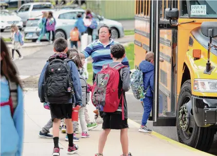  ?? Christian Abraham/Hearst Connecticu­t Media file photo ?? Students at North Street School head home on April 25. Greenwich’s Board of Education created goals for the Smarter Balanced Assessment this year, but students didn’t reach them.