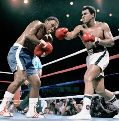  ?? Files/AP ?? Ali’s blows had swollen Frazier’s right eye nearly shut, and he was nearly blind in his left due to a training injury.
Later, it was revealed that Ali himself wanted to quit.
The Thrlla in Manila heavyweigh­t boxing bout had Joe Frazier beaten nearly blind and Muhammad Ali on the verge of surrender.