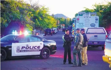  ?? ADOLPHE PIERRE-LOUIS/ JOURNAL ?? APD SWAT team members respond to a shooting near Granite NE on Monday. Police arrested Izaiah Garcia and have charged him with an open count of murder in the Sept. 29 slaying of Sean Markey.