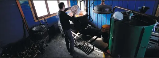  ?? ?? Milosevic sets up for making brandy Nov. 11 in Rozanci.