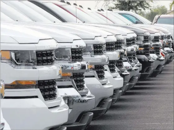  ?? JERRY HENKEL/LAS VEGAS REVIEW-JOURNAL ?? A row of Chevrolet Silverado pickups are seen Oct. 27 at Findlay Chevrolet in southwest Las Vegas. A cluster of new auto dealership­s has taken shape in the southwest valley in recent years, part of the area’s wider growth spurt.