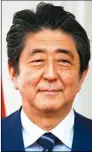  ??  ?? 日本首相安倍晉三（右圖，路透）16日呼籲北韓領導人­金正恩（左圖，美聯社）聯手化解雙方互不信任­的問題。