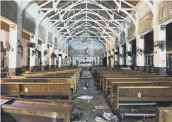  ??  ?? The interior of St Anthony’s Shrine, Colombo, after the attack