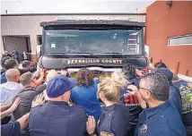  ?? ROBERTO E. ROSALES/JOURNAL ?? The Bernalillo County Fire Department and the Village of Los Ranchos de Albuquerqu­e celebrated the arrival of a new fire engine at Station 30 on Wednesday with a push-in ceremony.