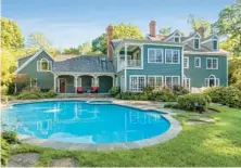  ?? MICHELE SHEIKO/CHESAPEAKE HOME IMAGES ?? 7637 square-feet with 6-bedrooms, 5 full- and 2 partial-bathrooms,4 fireplaces, 2-car garage, 2.01-acres A St. Margaret’s Waterfront home features access to Mill Creek with water views and a saltwater pool.
