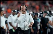  ?? MICHAEL CONROY — THE ASSOCIATED PRESS ?? Jaguars coach Urban Meyer walks the sideline during a loss to the Bengals on Sept. 30