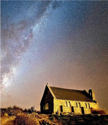  ??  ?? The night sky above the Church of the Good Shepherd twinkles on a crisp, clear night.