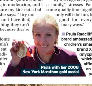  ??  ?? Paula with her 2008 New York Marathon gold medal