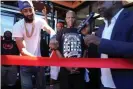  ?? Photograph: Jorge Peniche ?? Nipsey Hussle, left, at the grand opening of The Marathon Clothing store in 2017.