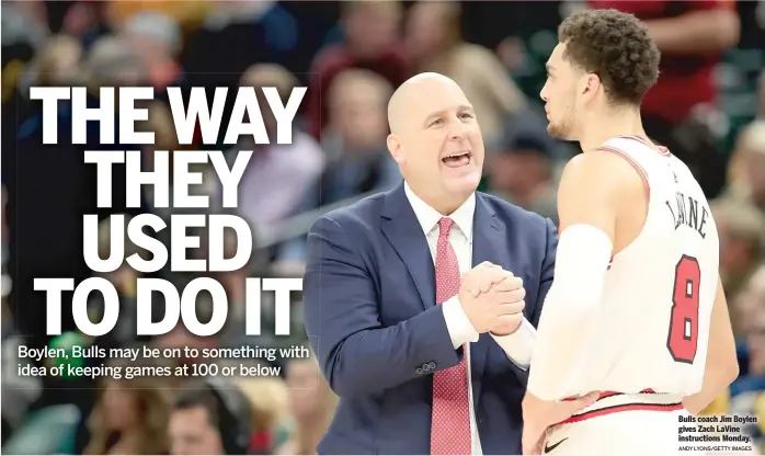  ?? ANDY LYONS/GETTY IMAGES ?? Bulls coach Jim Boylen gives Zach LaVine instructio­ns Monday.