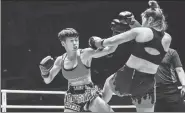 ?? PROVIDED TO CHINA DAILY ?? Chuang Kai-ting connects with a straight left against Muay Thai specialist Yodcherry Sityodtong during her five-round victory by unanimous decision to win the inaugural One Super Series world atomweight title.