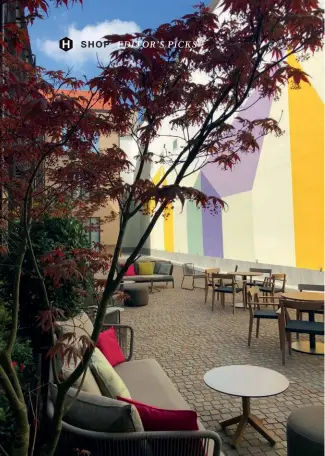  ??  ?? TOP TO BOTTOM The vibrant courtyard of the Savona 18 Suites boutique hotel; Caffè Fernanda is a stylish spot for a coffee break; The Manzoni restaurant features furniture and lighting collection­s by Tom Dixon