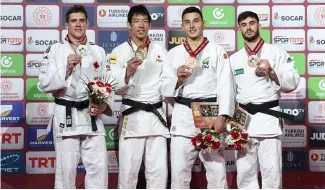  ?? ?? Le podium masculin de la deuxième journée du Grand Chelem de Judo d'Antalya.