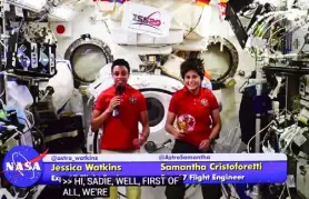  ?? Matthew Jonas, Daily Camera ?? Astronauts Jessica Watkins, left, and Samantha Cristofore­tti answer questions from Fairview High School students from the Internatio­nal Space Station on Monday.