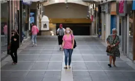  ?? Photograph: Matthew Horwood/Getty ?? People walk through a shopping centre in Bridgend, south Wales. Haldane said the recovery of consumer spending had surprised the Bank.