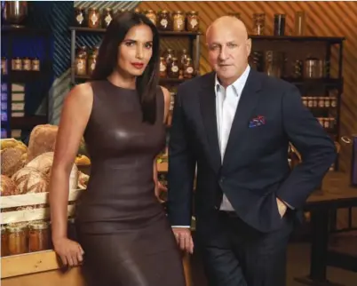  ??  ?? Padma Lakshmi and Tom Colicchio in “Top Chef”