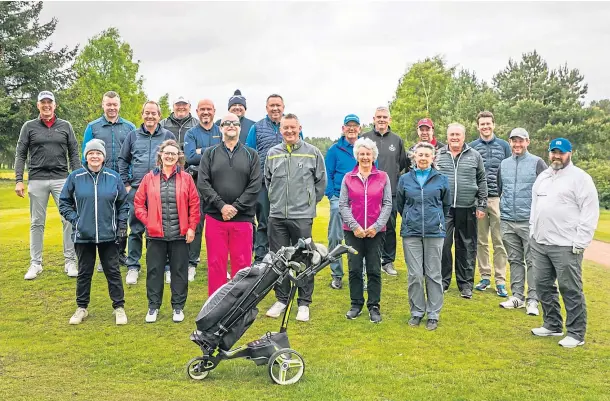  ?? ?? PAR-FECT DAY: The Scottish Disability Golf and Curling members hold a pro-am day at Ladybank Golf Club.