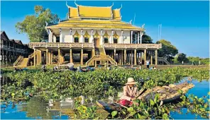  ??  ?? Monks walking in the ruins of Ta Prohm temple, right; a floating shop on Tonle Sap lake, left; Central Market in Phnom Penh, far right; Kampong Khleang, bottom right; Harriet O’Brien (left) and her sister, below