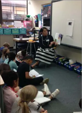  ?? JORDANA JOY — THE MORNING JOURNAL ?? JaNiece Whitehead, a third-grade teacher at Prospect Elementary School in Oberlin, reads the story of Katherine Johnson. As a part of her Black History Month lesson every Friday, Whitehead reads a story to the students.