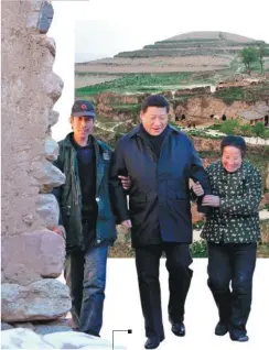  ?? PANG XINGLEI / XINHUA ?? 2012: Xi Jinping, general secretary of the Communist Party of China Central Committee, visits a poor family in Luotuowan village, deep in the mountains of Hebei province.