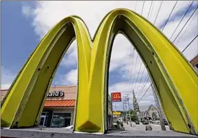  ?? Gene J. Puskar / Associated Press archive ?? U.S. restaurant­s and stores, such as Mcdonald’s, are rapidly raising pay in an urgent effort to attract more applicants and keep up with a flood of customers as the pandemic eases.