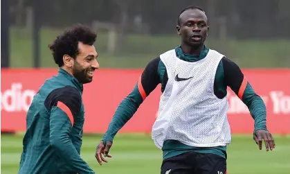  ?? Liverpool FC/Getty Images ?? Liverpool’s Mohamed Salah (left) and Sadio Mané train this week for Saturday’s Champions League final. Photograph: John Powell/