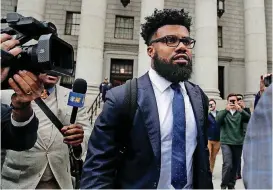  ?? [AP PHOTO] ?? Dallas Cowboys running back Ezekiel Elliott walks out of federal court on Thursday in New York after a three-judge panel ruled that Elliott must serve his six-game suspension while it considers his appeal.