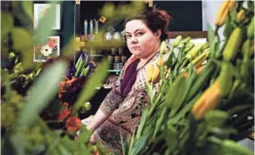  ?? ARIEL COBBERT/THE COMMERCIAL APPEAL ?? Kelsey Connor, owner of wedding planning firm Connor & Co., prepares flowers at her shop for a wedding at Graceland in Memphis on June 18, in reaction to COVID-19.