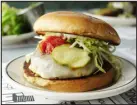  ?? ?? The Superiorit­y Burger at the restaurant of the same name in New York City. The meatless hamburger is made with quinoa, chickpeas and walnuts, and represents transparen­cy and purity of ingredient­s that will be popular in 2024. KARSTEN MORAN — THE NEW YORK TIMES