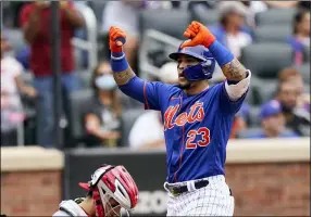  ?? COREY SIPKIN — THE ASSOCIATED PRESS ?? The Mets’ Javier Baez gestures at home plate after his two-run home run against the Nationals on Aug. 29 in New York.