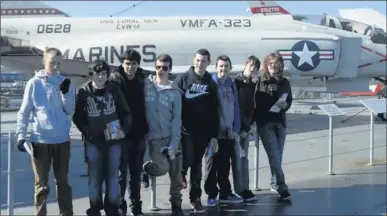  ??  ?? The students from Wexford CBS at the Intrpid Sea, Air & Space Museum, and (below) in Times Square, New York.