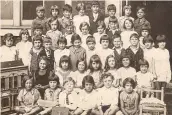  ??  ?? Pals: Les Wynn (third from right in fourth row) at Gayhurst Road School, 1930. Violet is third from right in the second row
