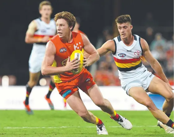  ??  ?? Suns backline star Jesse Joyce in control during a clash with the Adelaide Crows at the Gold Coast last year.