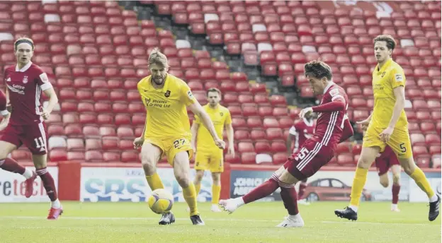  ??  ?? 0 Scott Wright slots the ball home in the 55th minute to double Aberdeen’s lead against Livingston at Pittodrie as the Dons built on their midweek win over St Johnstone.