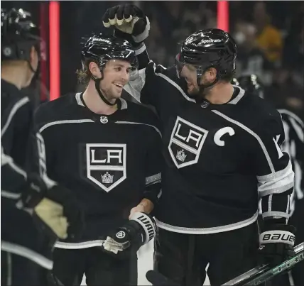  ?? ASHLEY LANDIS — THE ASSOCIATED PRESS ?? Adrian Kempe, left, doesn't have the playoff experience of veteran Kings captain Anze Kopitar going into tonight's Game 7at Edmonton.