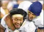  ?? HYOSUB SHIN / HSHIN@AJC.COM ?? Georgia Tech’s TaQuon Marshall (left) and Tobias Oliver celebrate their victory over Miami on Saturday.