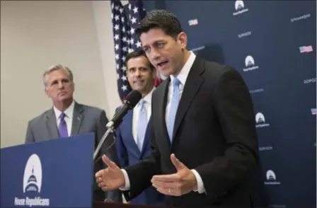  ?? J. SCOTT APPLEWHITE — THE ASSOCIATED PRESS ?? House Speaker Paul Ryan of Wis., right, joined by, from left, House Majority Leader Kevin McCarthy of Calif., and Rep. John Ratcliffe, R-Texas, meets with reporters following a GOP strategy session, Tuesday on Capitol Hill in Washington.