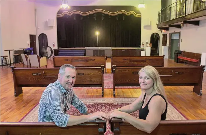  ?? Paul Buckowski / Times Union ?? Jenn Miller, right, and her husband Justin Miller, inside Lark Hall, a new performanc­e space they have opened on Hudson Ave. near Albany’s Lark Street.