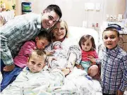  ?? [PHOTO PROVIDED BY KRISTIN LINSENMEYE­R PHOTOGRAPH­Y] ?? Tiffany Spierling and her growing family gather after the birth of her fifth child. With her are husband, Tristan, and children, Landon, 7, Colton, 5, Callum, 3, and Blythe, 1, and newborn Lawton.