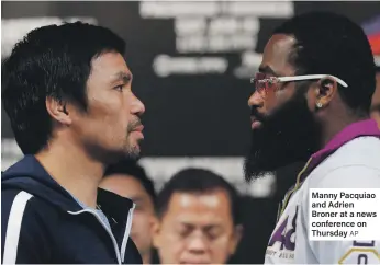  ?? AP ?? Manny Pacquiao and Adrien Broner at a news conference on Thursday