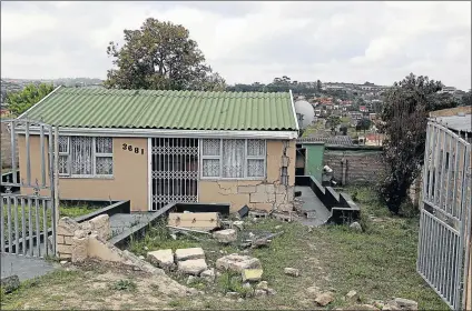  ?? Picture: SIBONGILE NGALWA ?? UNFIT TO INHABIT: The Mdantsane family’s home, which a BCM truck driver drove into on September 18 this year. The house’s walls are cracked and could collapse at any moment