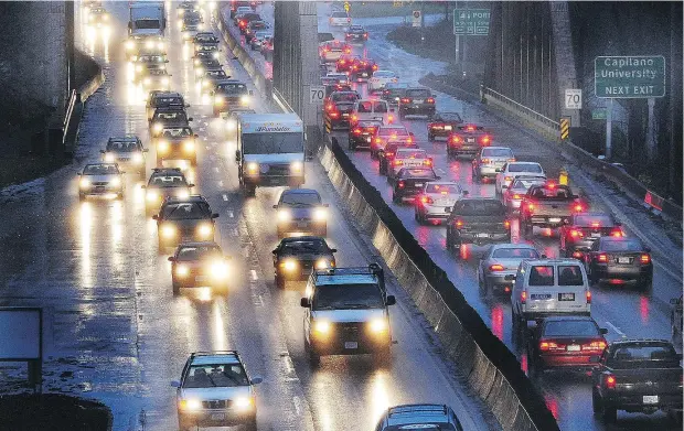  ?? WAYNE LEIDENFROS­T/ PNG FILES ?? Traffic lines up to get on and off the Ironworker­s Memorial Bridge in North Vancouver, a familiar sight to commuters.