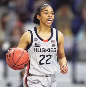  ?? Elsa / Getty Images ?? UConn’s Evina Westbrook dribbles down court against Arizona during the second quarter in the Final Four in San Antonio in April.