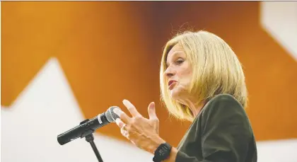  ?? DAVID BLOOM ?? NDP Leader Rachel Notley speaks at Escuela Mill Creek gym Tuesday as her party launched a series of town-hall meetings on the budget.