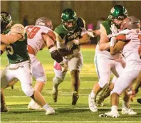  ?? APRIL GAMIZ/THE MORNING CALL ?? Emmaus’ Josiah Williams carries the ball against Parkland on Friday in Emmaus.