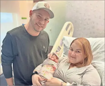  ?? Adventheal­th Gordon ?? Emma Palemo Archila, pictured with her mother Tina Bernal Archila and father Jonathan Palemo, was the first baby born at AdventHeal­th Gordon in 2022.