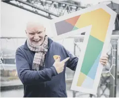  ??  ?? 0 Sir Tom Hunter, above, celebrates the money raised by a record-breaking 25,000 Kiltwalker­s