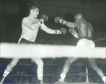  ?? PHOTO PROVIDED ?? Diveronica in action against Al Sewell in Syracuse in 1964