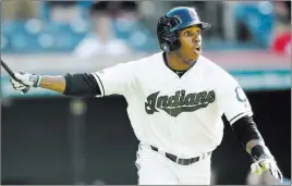  ?? Tony Dejak ?? The Associated Press Greg Allen follows through on his first home run of the season, a walk-off shot in the 14th inning of the Indians’ 10-9 win over the Astros on Sunday at Progressiv­e Field.